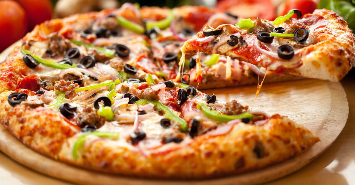  A Pizza that was cooked over a campfire