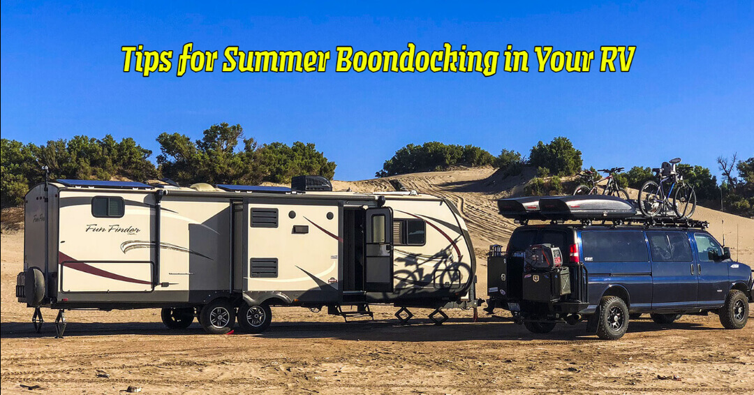 A travel trailer summer boondocking in the dunes