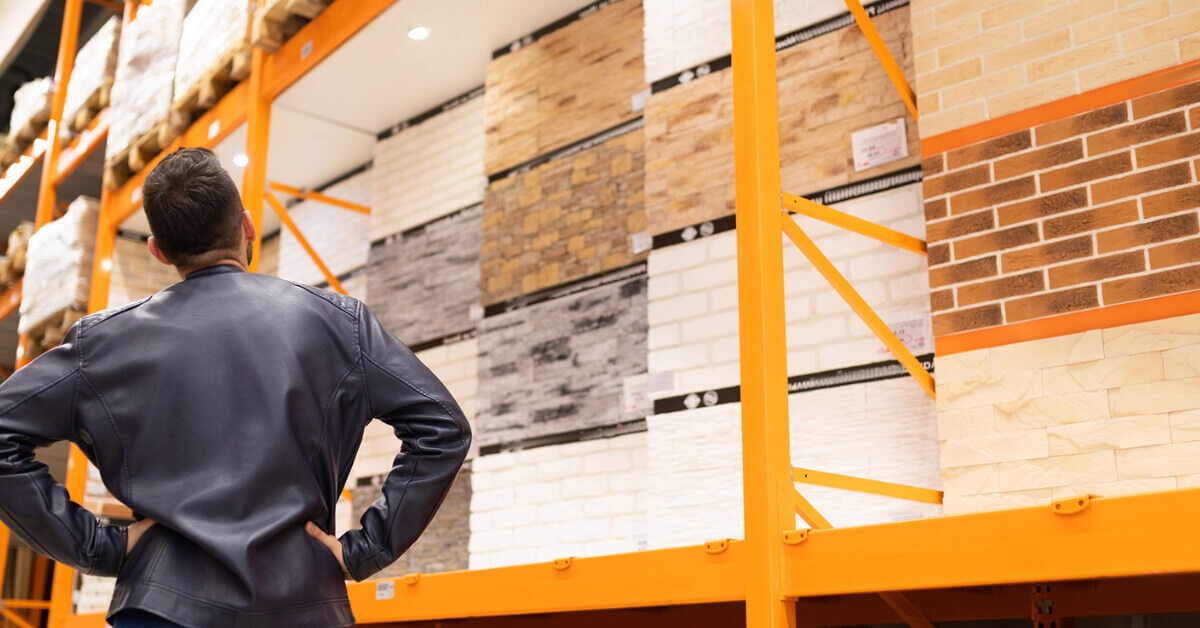 Man shopping for tiles for his RV's kitchen tile backsplash
