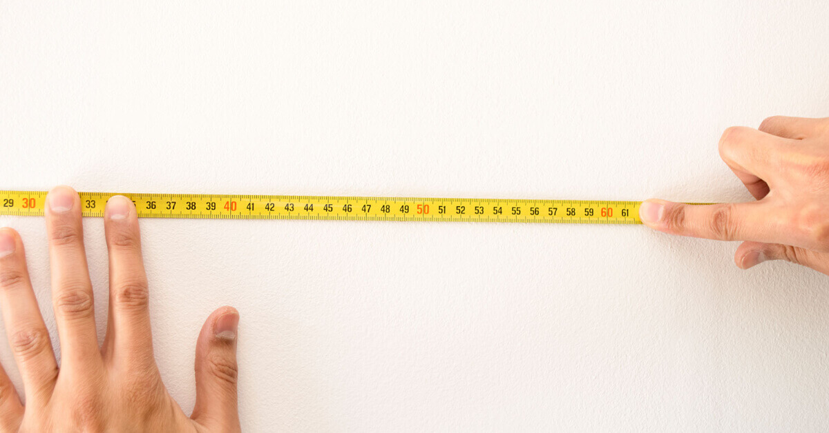 Measuring an RV kitchen wall to prepare for installing a tile backsplash