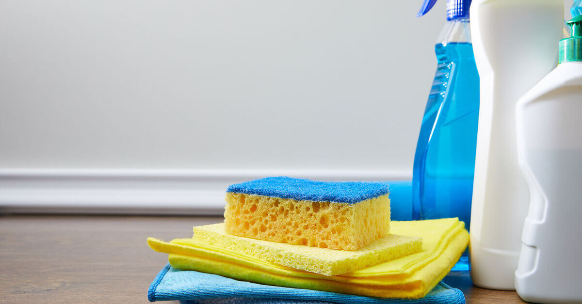 Cleaning a wall to prepare for installation of a tile backsplash in an RV kitchen