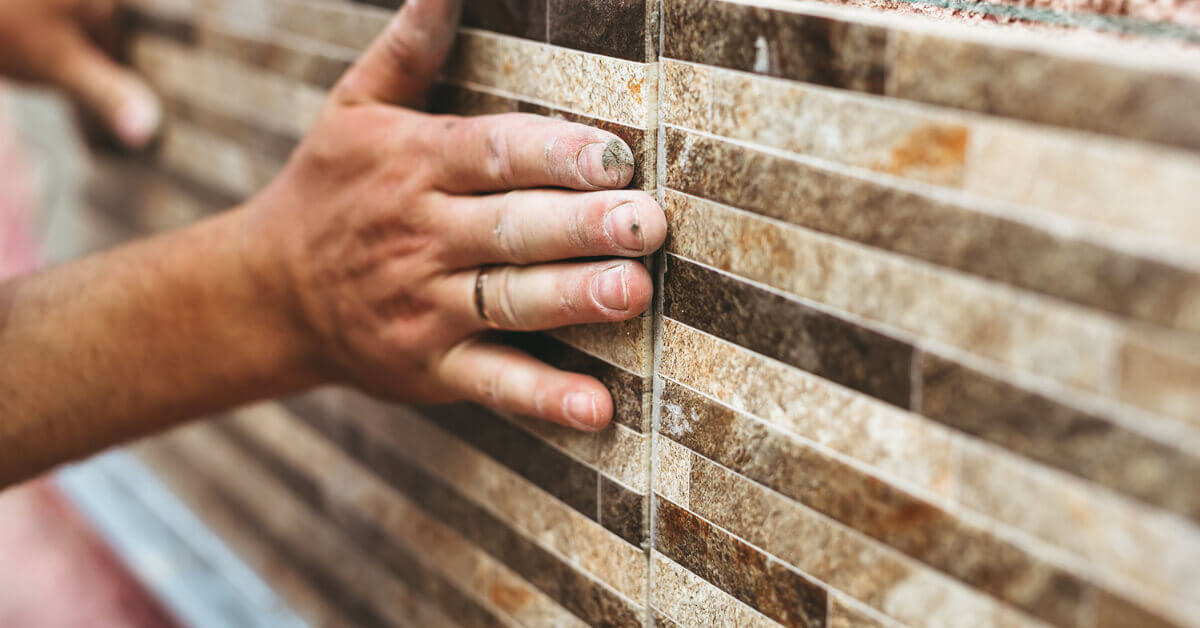 Installing RV kitchen backsplash tiles