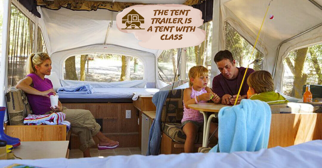 A family sitting inside their Tent Trailer working on their fishing gear