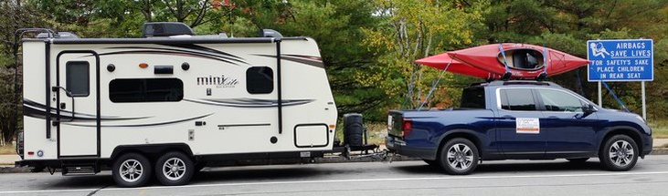 travel trailer vs truck camper