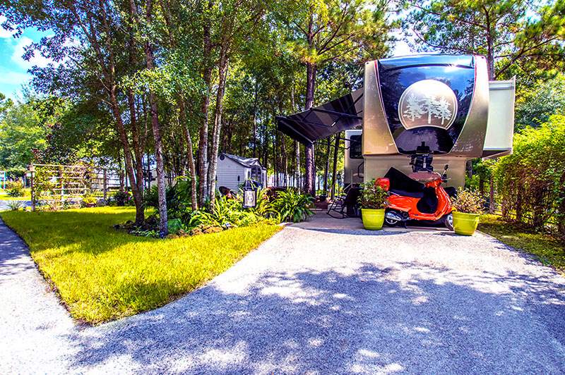 A beautiful RV campsite at Williston Crossings RV Resort in Williston Florida